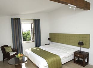 Slaapkamer voor 1 a 2 personen van vakantiehuis Bacchus op Domaine la Vernède